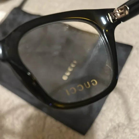 New gucci glasses. Never worn. Authentic. Can provide receipt. Cloth & case. - Picture 10 of 14